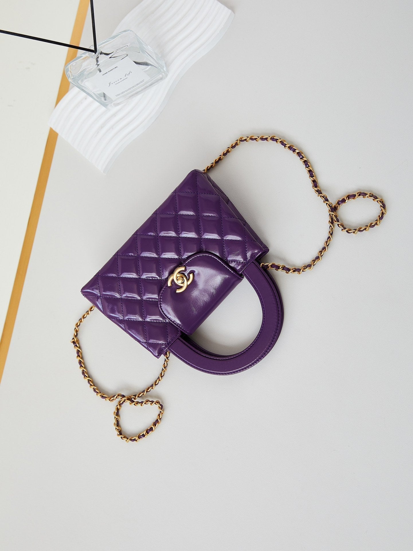 Bolso shopper Kelly CC 24A Nano de 19 cm en piel de cordero morada