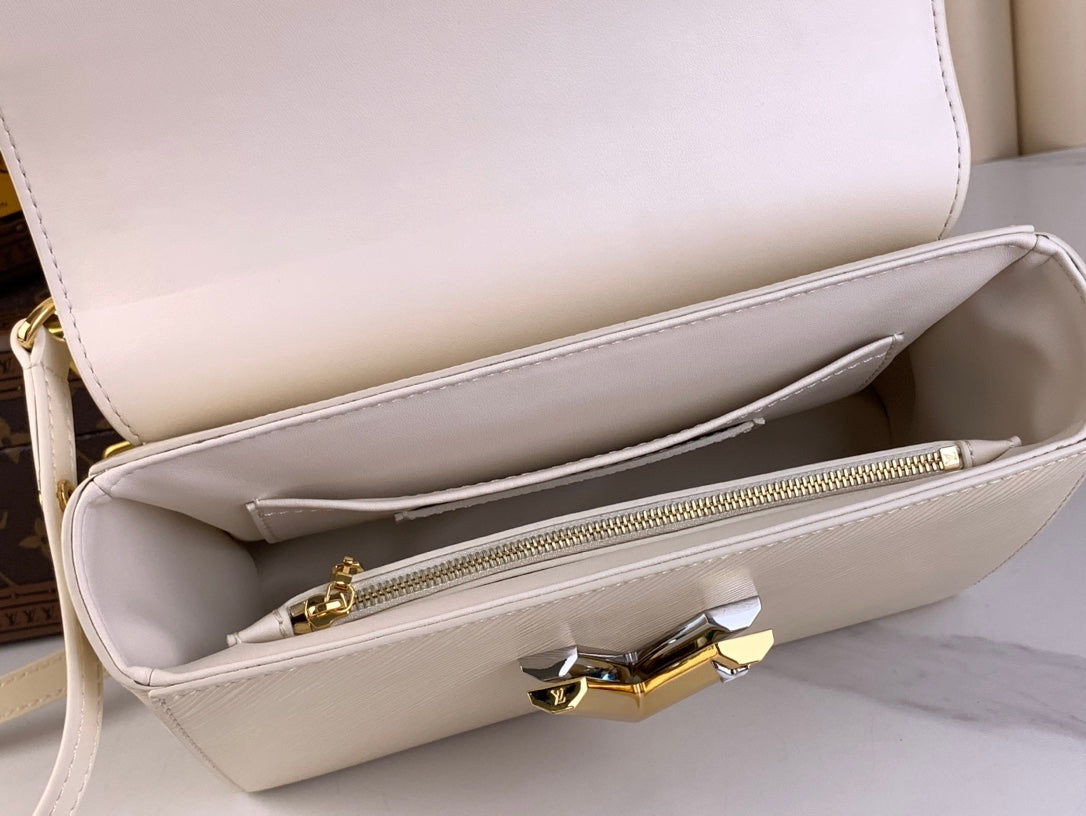 TWIST MM 23 EN CUARZO BLANCO EPI CUERO HARDWARE DORADO