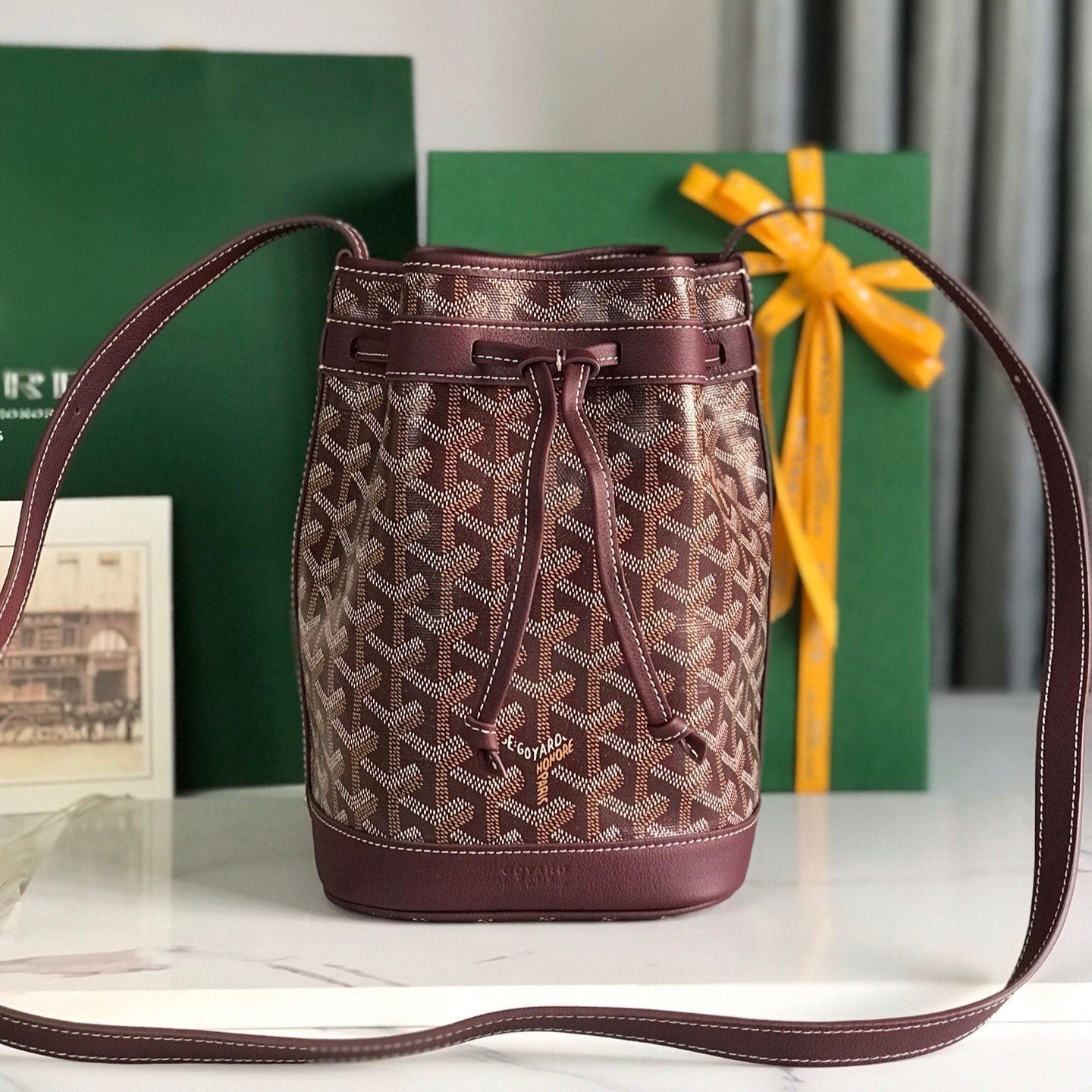 BOLSO CUBO PETIT FLOT 22 EN LONA GOYARDINE ROJO VINO Y RIBETE DE PIEL DE CORDERO