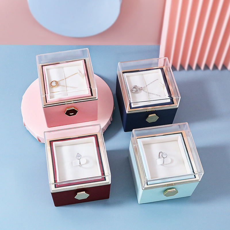 CREATIVE ROTATING PRESERVED ROSE JEWELRY GIFT BOX LOGO)