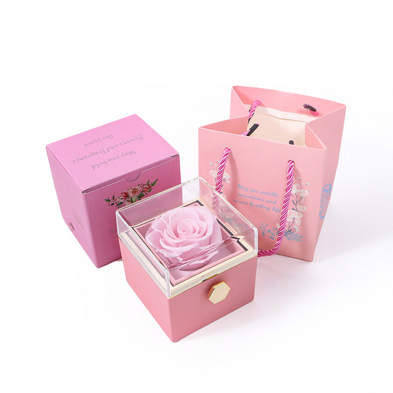 CREATIVE ROTATING PRESERVED ROSE JEWELRY GIFT BOX LOGO)