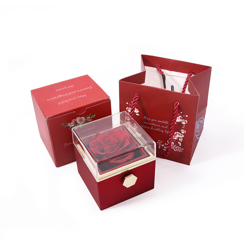 CREATIVE ROTATING PRESERVED ROSE JEWELRY GIFT BOX LOGO)