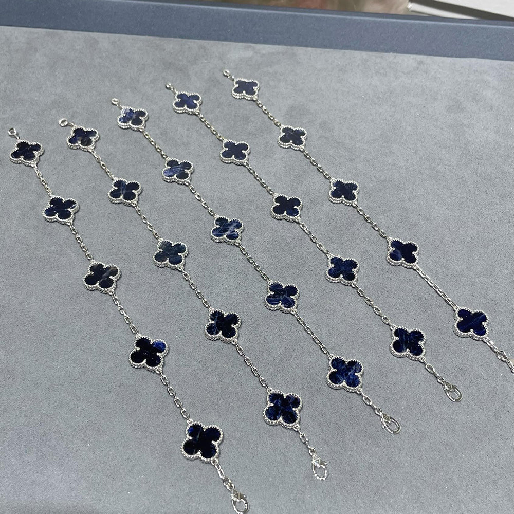 PULSERA DE PLATA DE PIETERSITA CON 5 MOTIVOS DE TRÉBOL DE DIANA