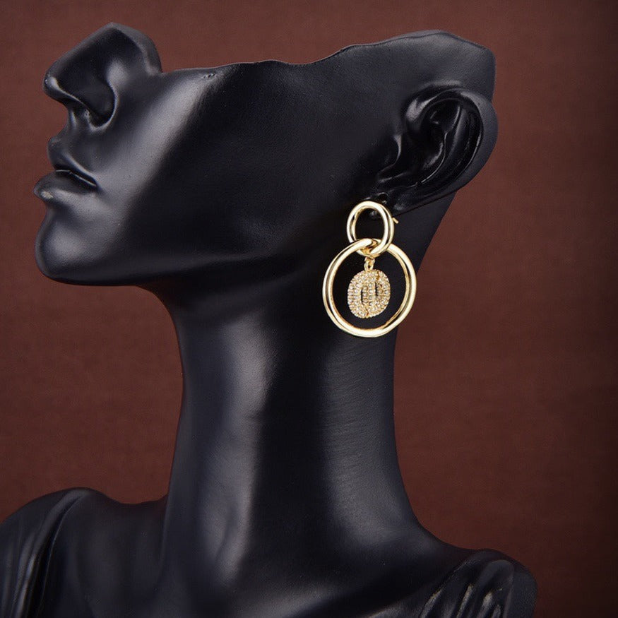 PENDIENTES DE ORO CON DIAMANTES Y GOTA DE CD