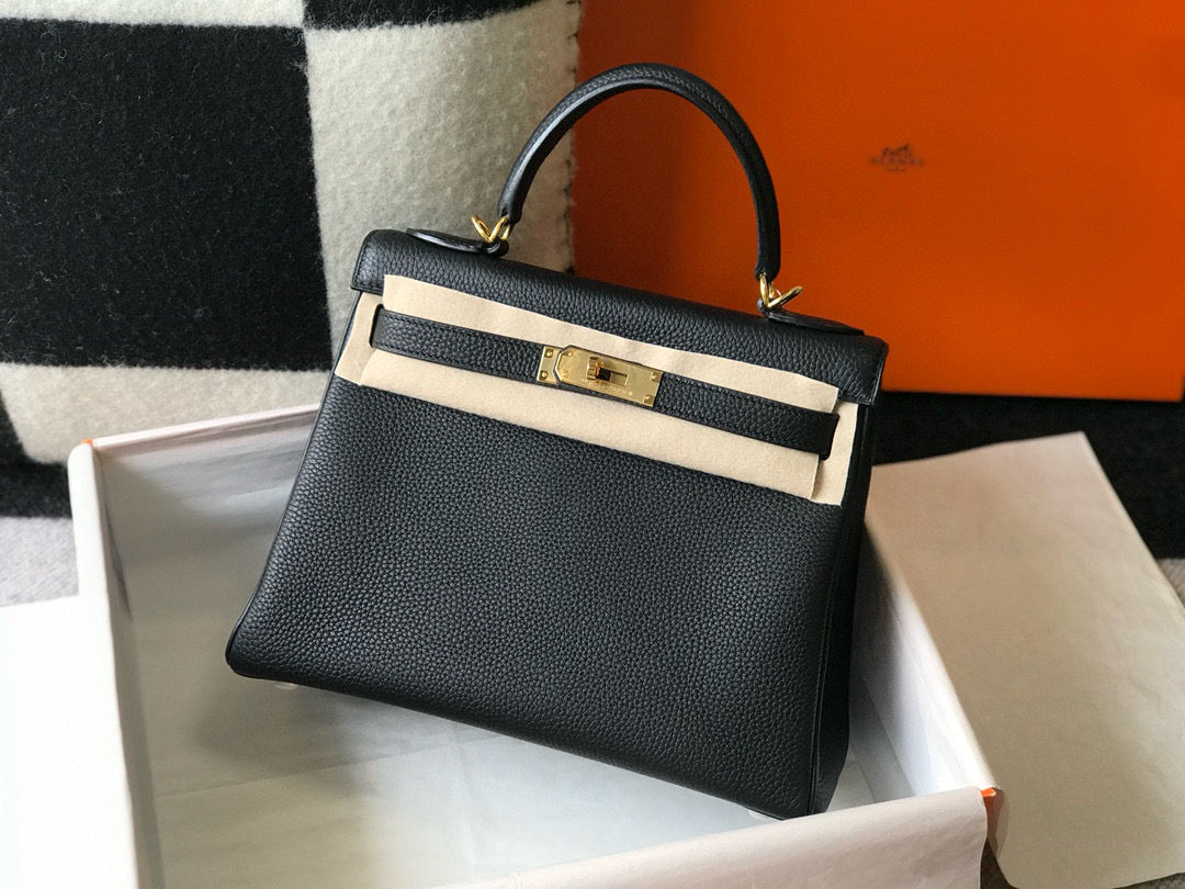 HM KELLY 28 CM NEGRO TOGO HARDWARE DORADO