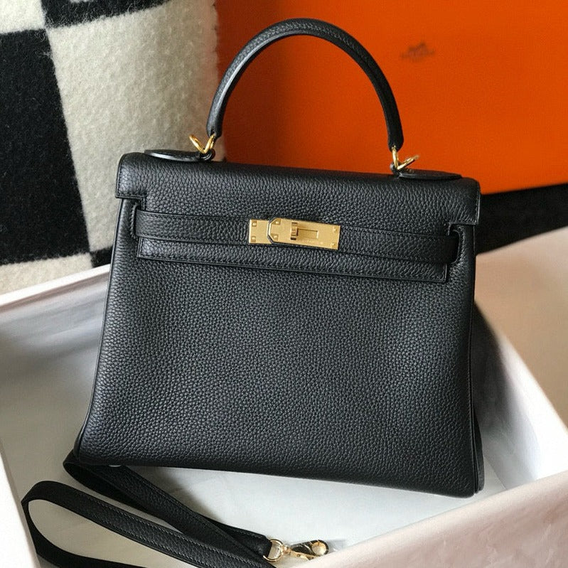HM KELLY 28 CM NEGRO TOGO HARDWARE DORADO
