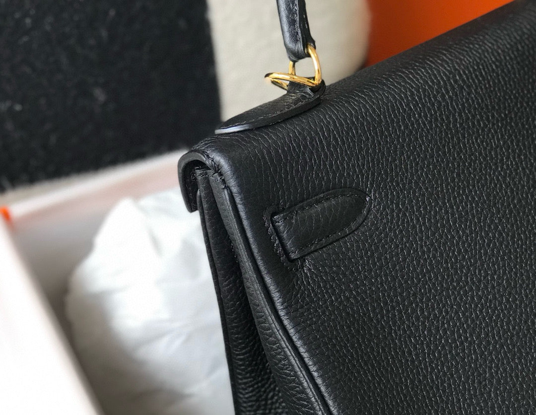HM KELLY 28 CM NEGRO TOGO HARDWARE DORADO