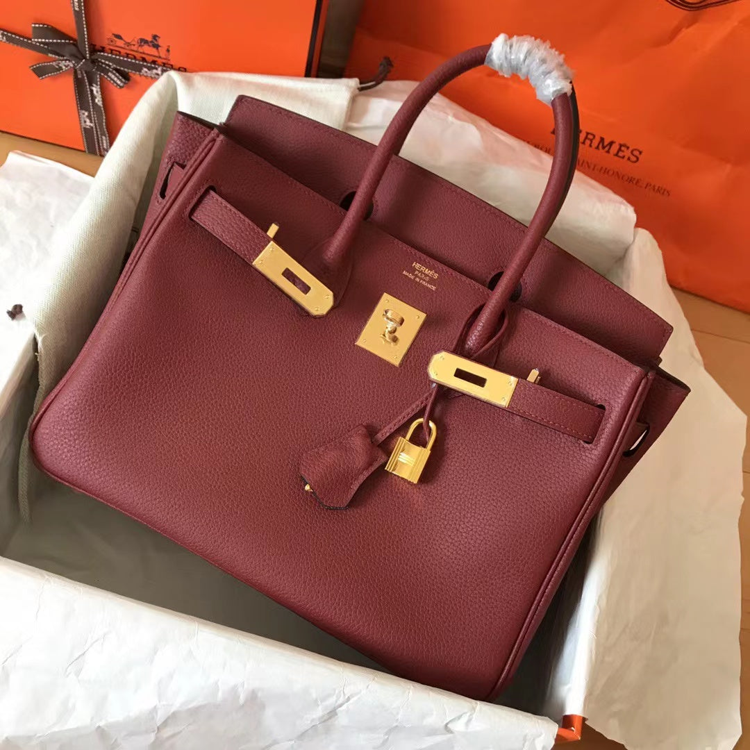 HM BIRKIN 25 CM VINO TINTO TOGO PIEL HIERROS DORADOS