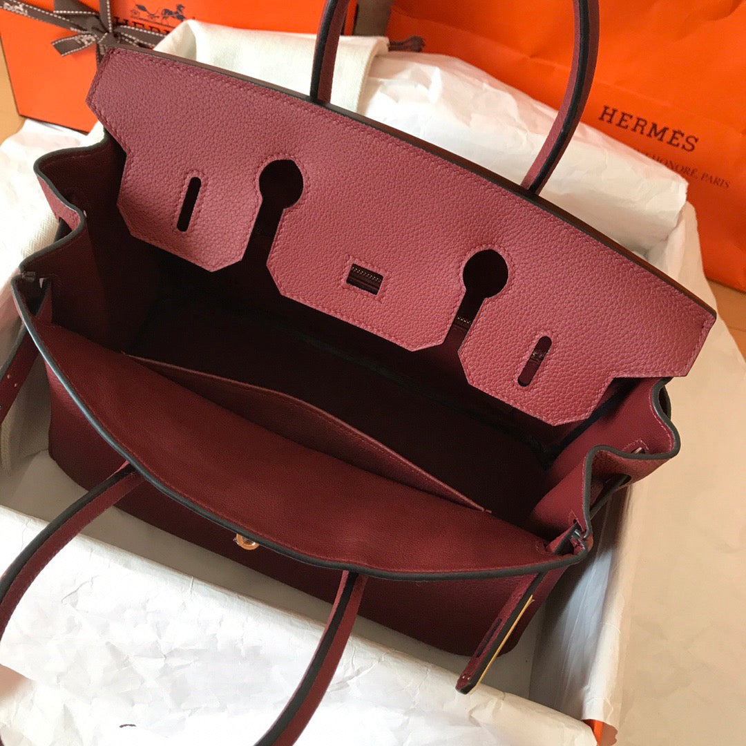 HM BIRKIN 25 CM VINO TINTO TOGO PIEL HIERROS DORADOS