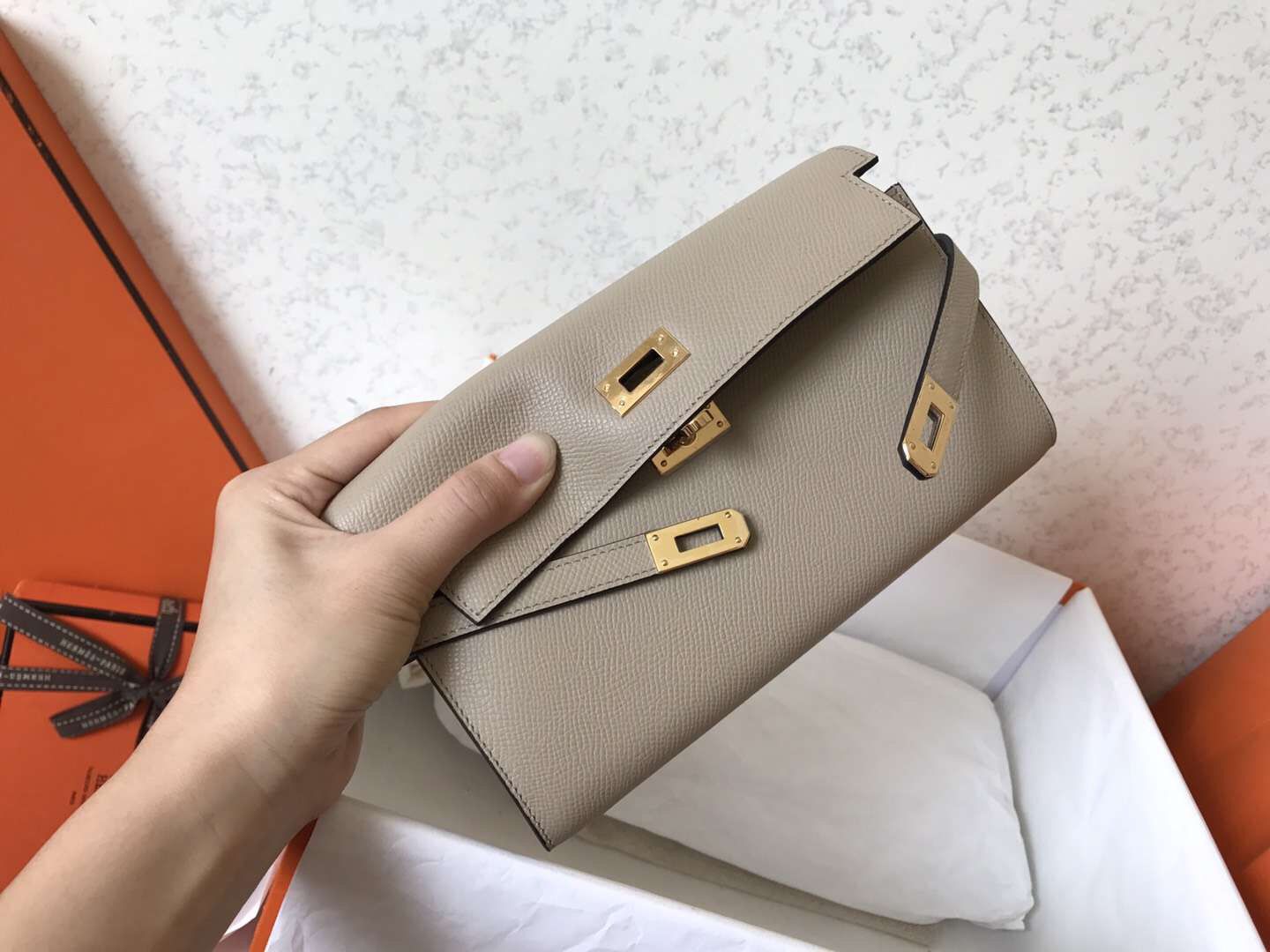 Cartera Kelly Long de 20 cm de piel Epsom gris