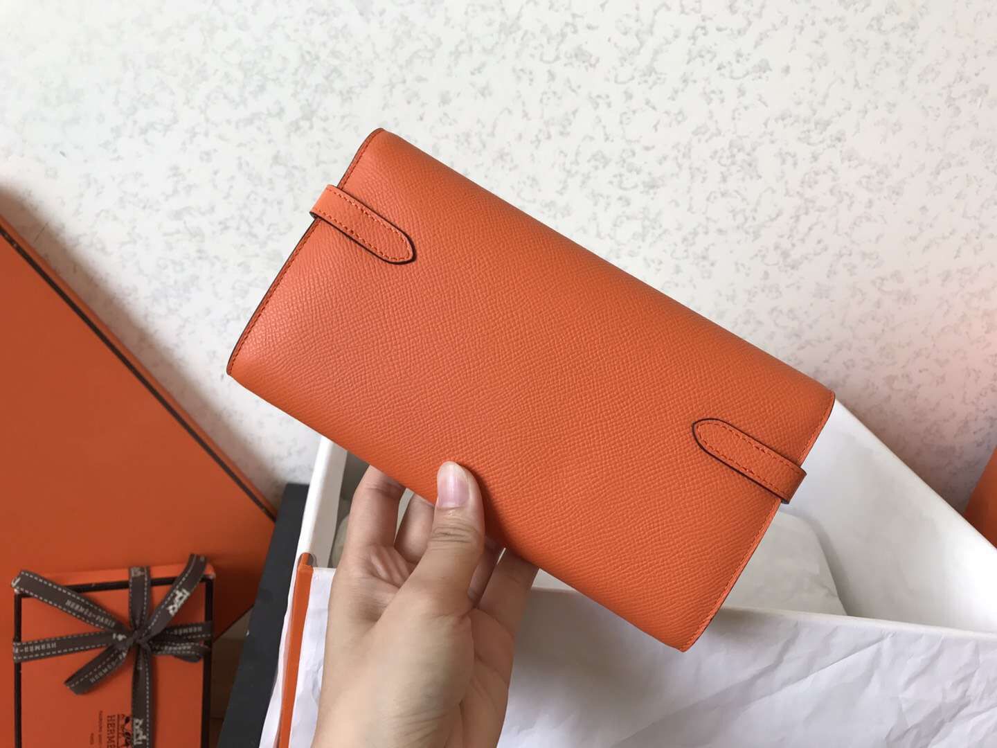 Cartera larga Kelly de 20 cm de piel Epsom naranja