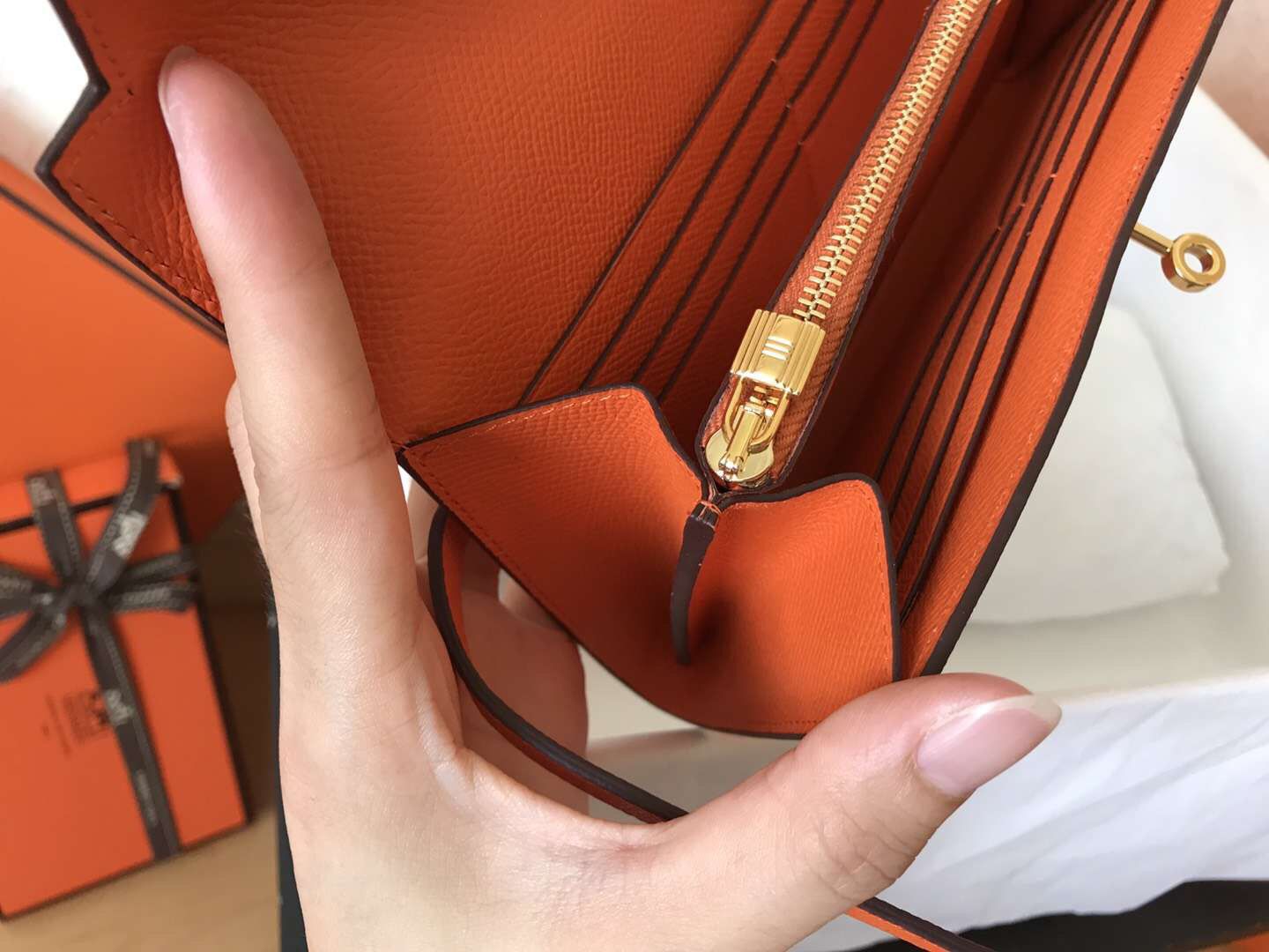 Cartera larga Kelly de 20 cm de piel Epsom naranja