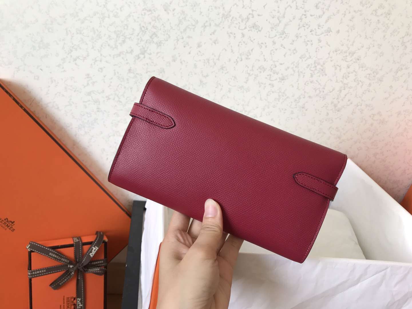 Cartera larga Kelly de 20 cm de piel Epsom color rojo oscuro