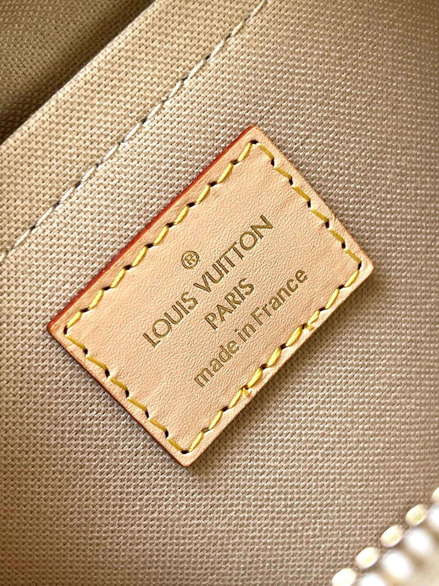 SPEEDY BANDOULI¨¨RE 20 EN JACQUARD MONOGRAMA BLANCO Y RIBETE DE PIEL DE BECERRO BEIGE