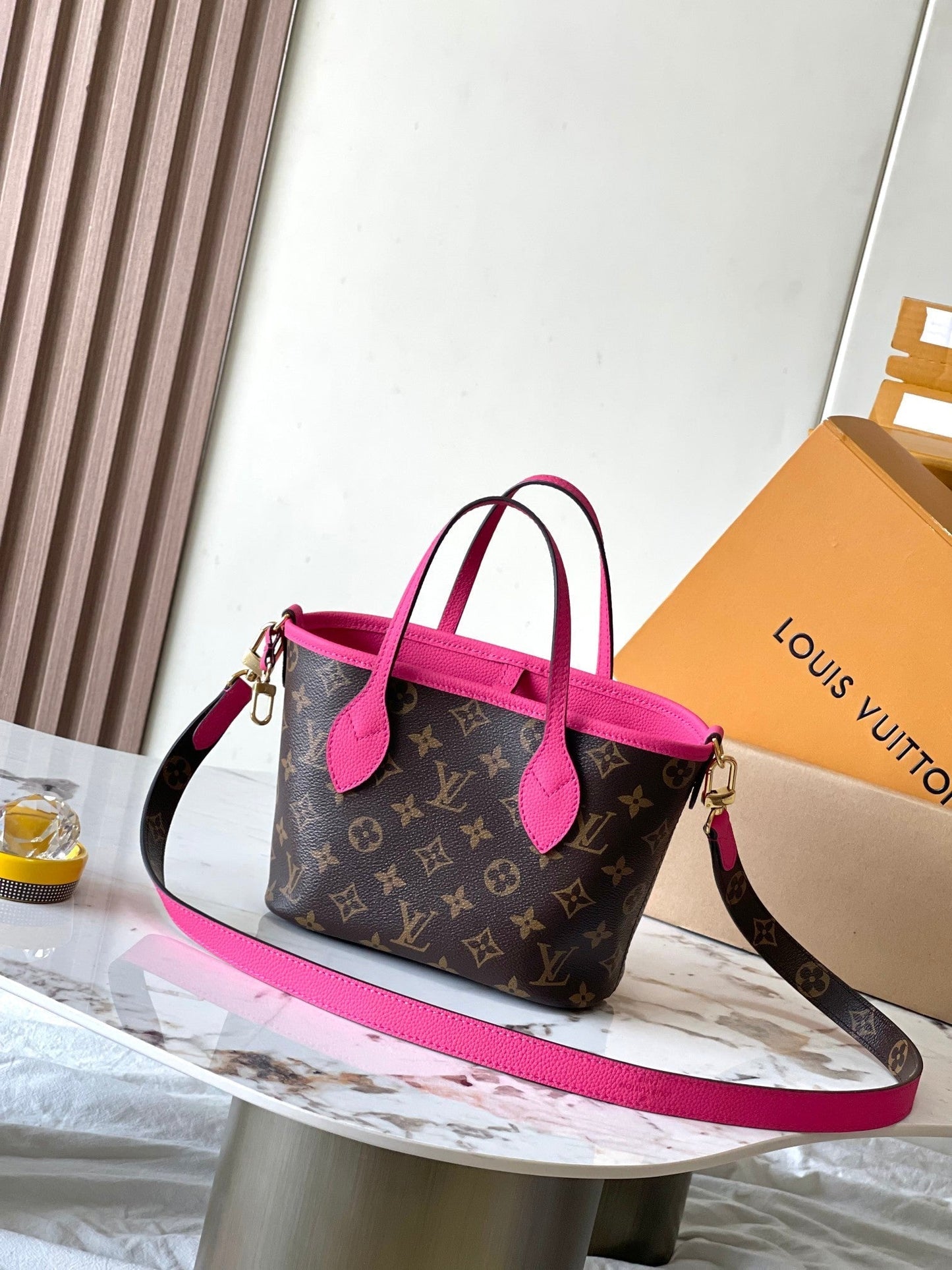 NEVERFULL BANDOULI¨¨RE INSIDE OUT BB 24 EN LONA MONOGRAMA MARRÓN Y PIEL DE BECERRO ROSA