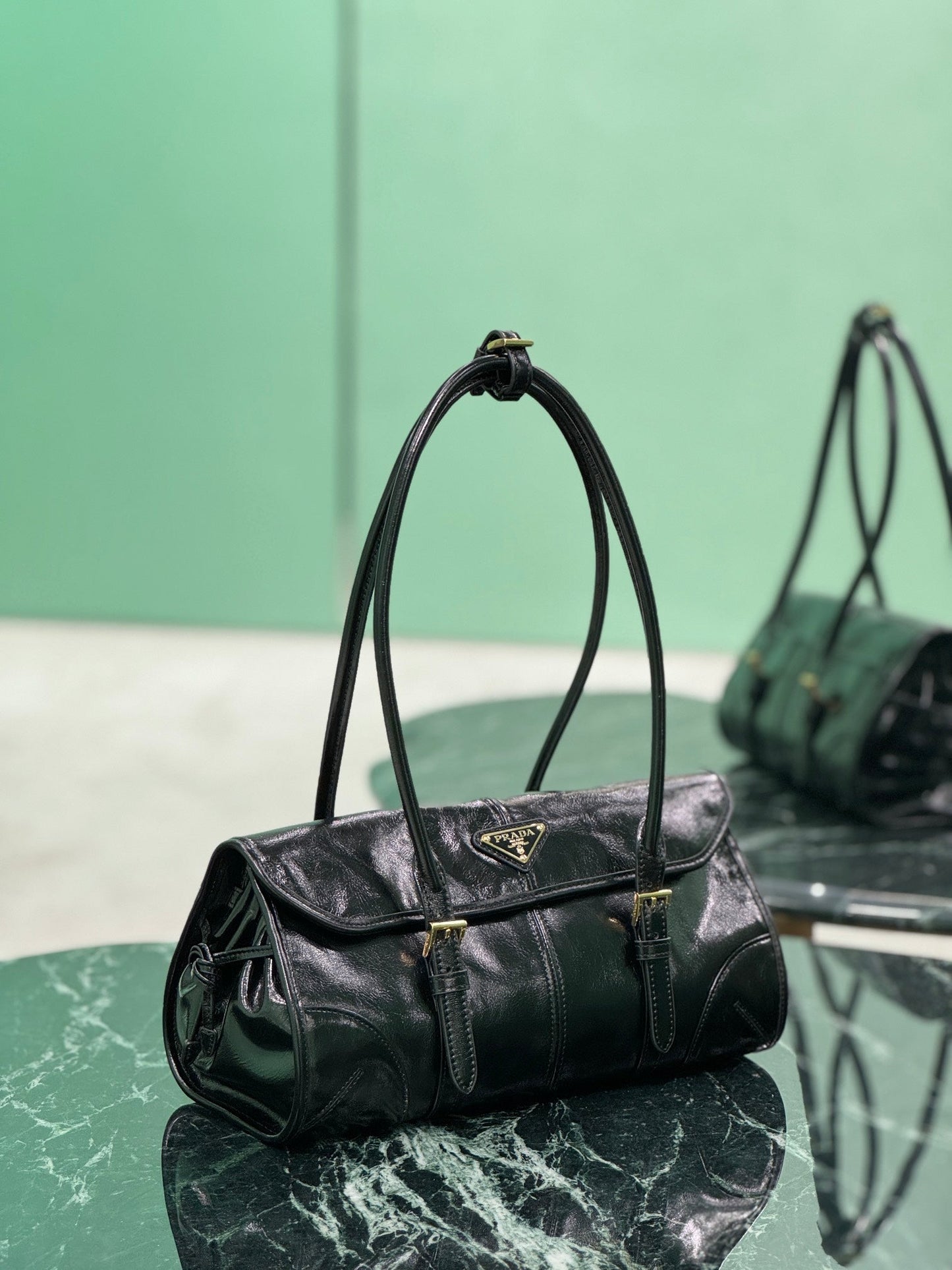 HANDBAG 31 IN BLACK OIL WAX LAMBSKIN