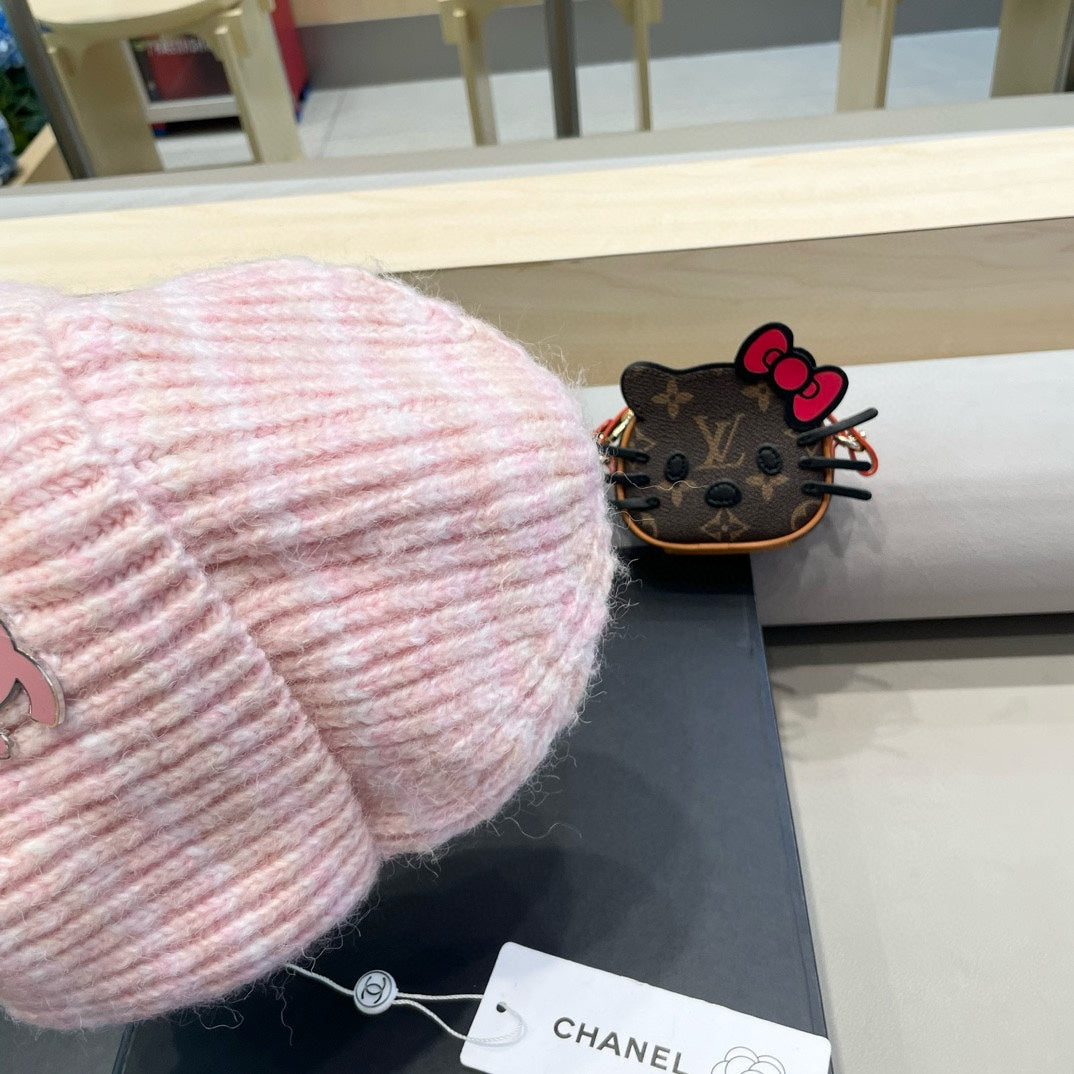 GORRO DE PUNTO A RAYAS EN LANA ROSA CLARO 424515