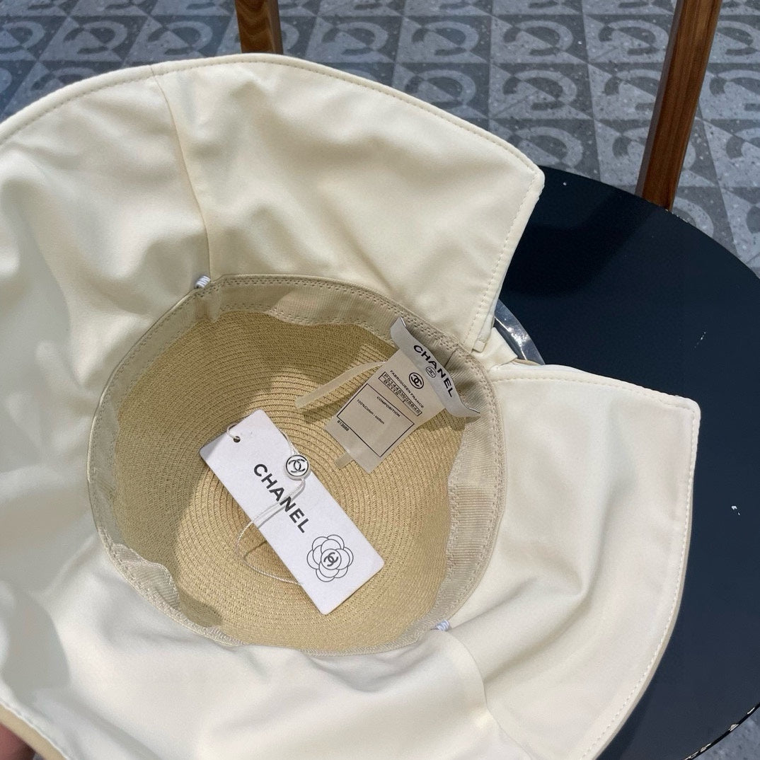 BOW BUCKET HAT IN EGG NOG BEIGE RAFFIA 426170