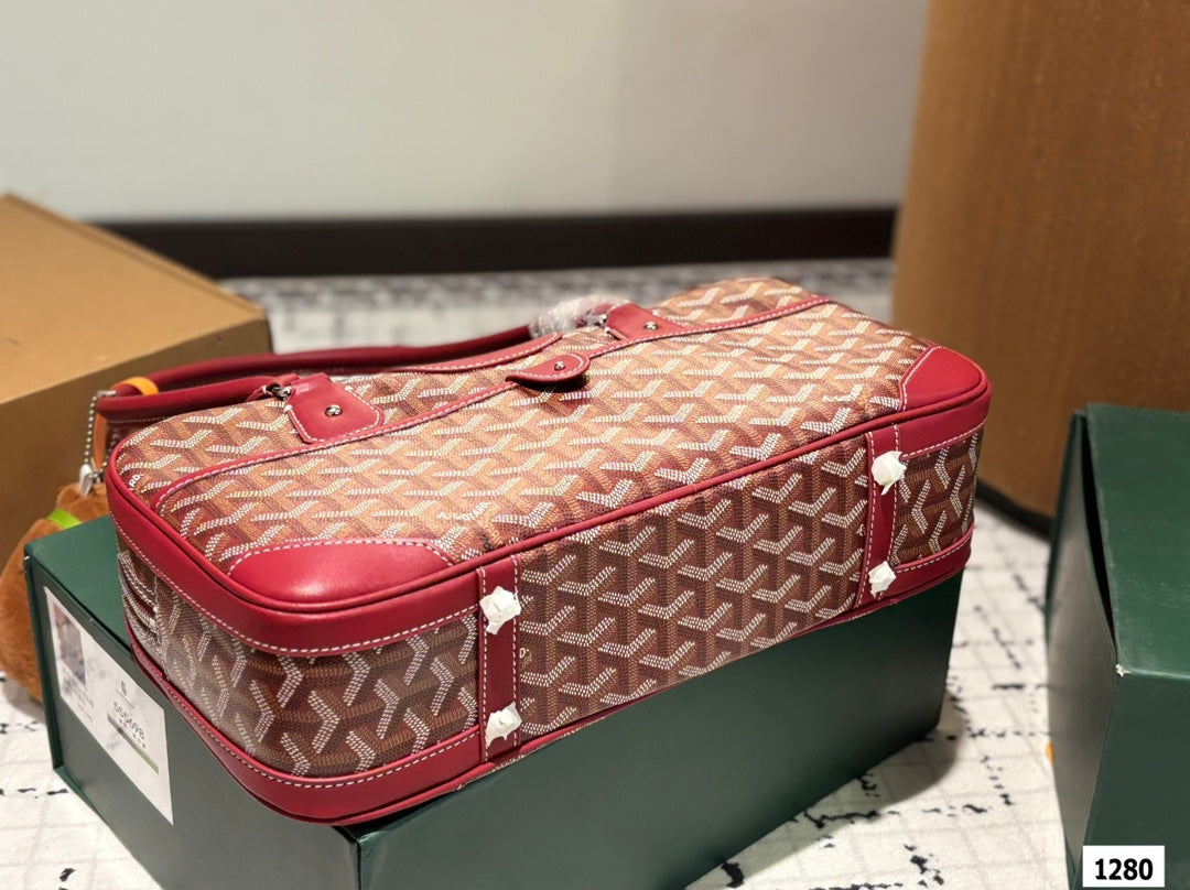 SAC SAINT MARTIN 35 EN TOILE GOYARDINE ROUGE BORDEAUX ET CUIR DE VEAU