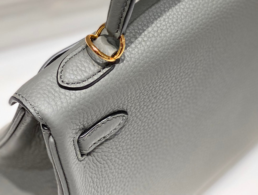 hm kelly 32 cm cuir togo gris accessoires dorés