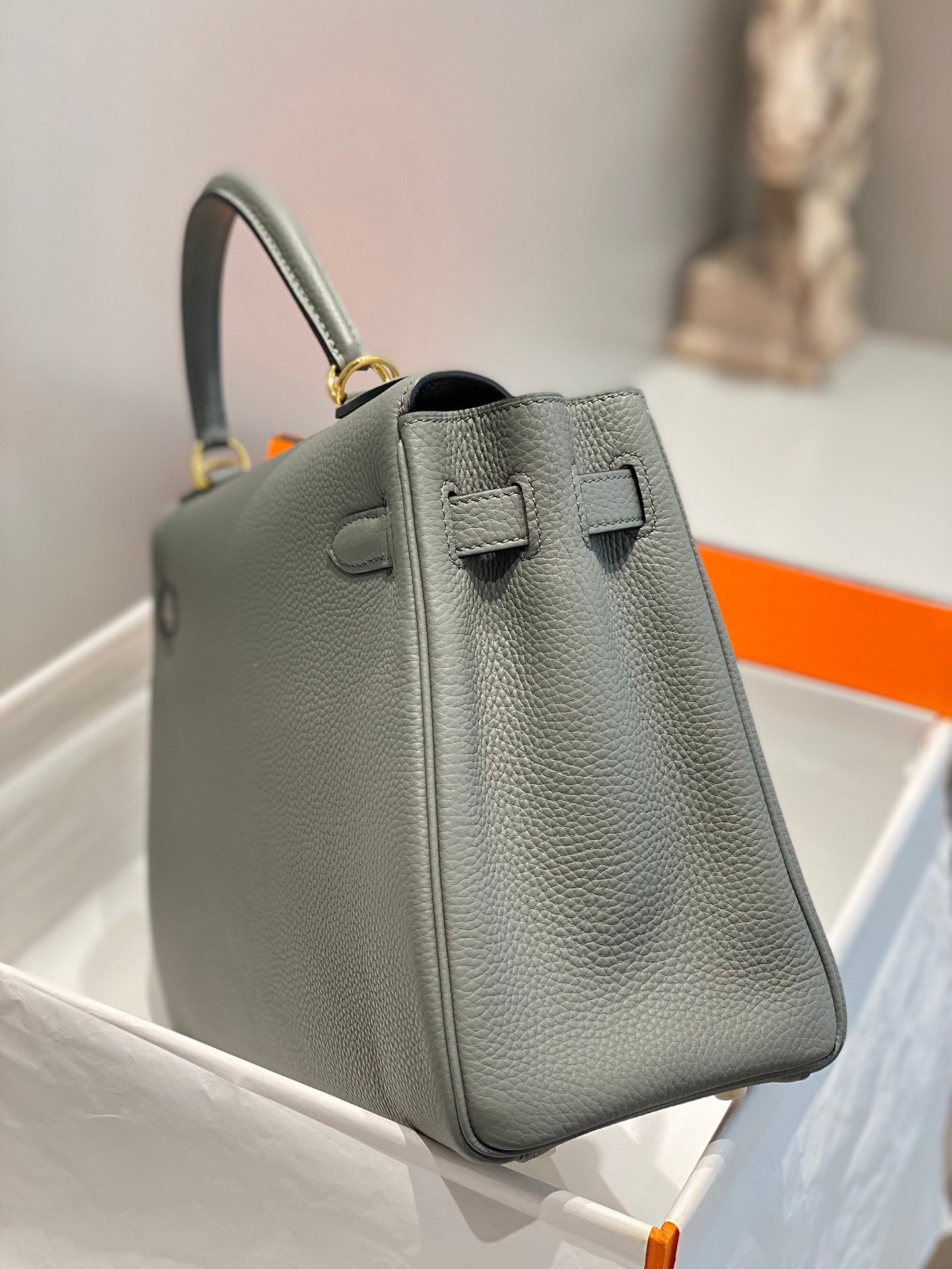 hm kelly 32 cm cuir togo gris accessoires dorés