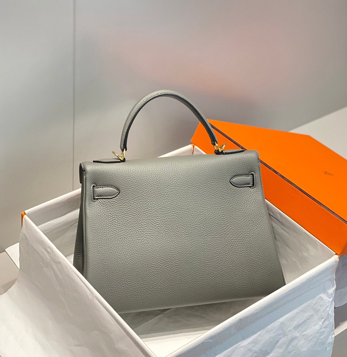 hm kelly 32 cm cuir togo gris accessoires dorés