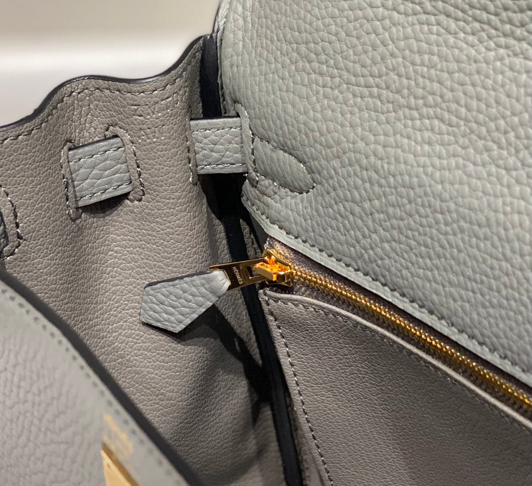 hm kelly 32 cm cuir togo gris accessoires dorés