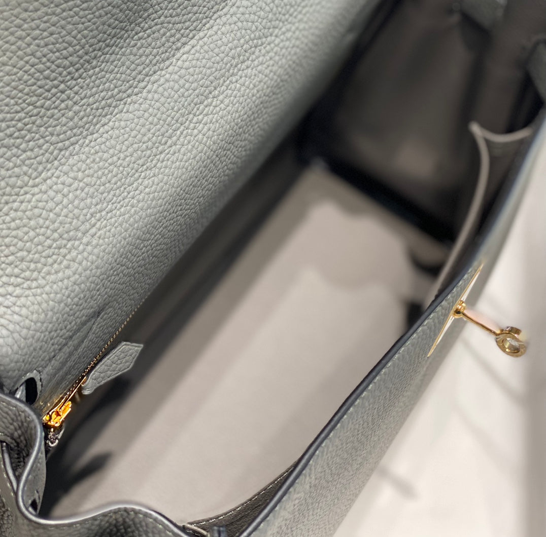 hm kelly 32 cm cuir togo gris accessoires dorés