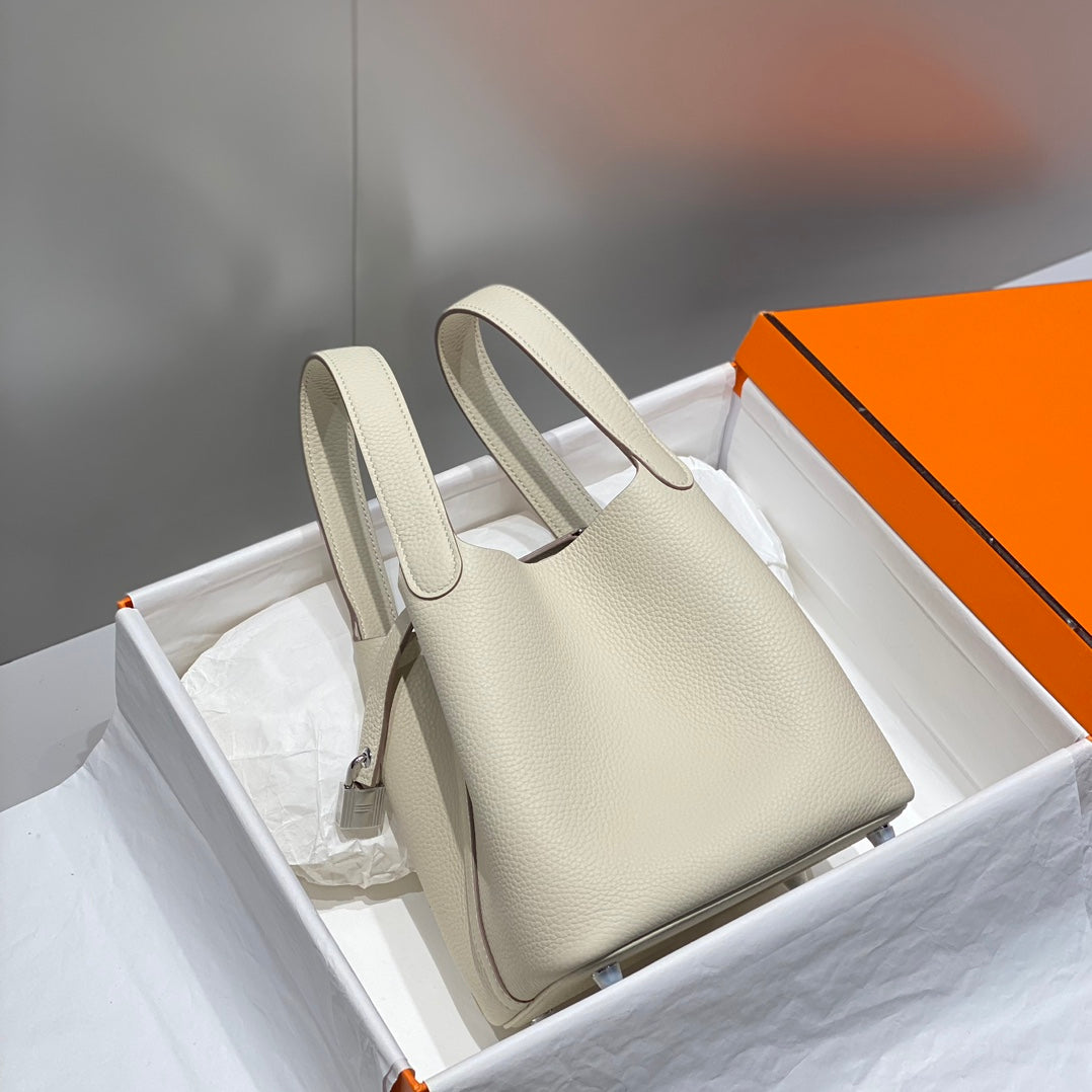 serrure à picotin en cuir Togo ivoire et quincaillerie argentée