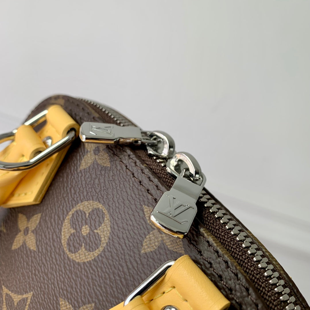 Alma Nano 18 Monogram Canvas, piel de becerro amarilla