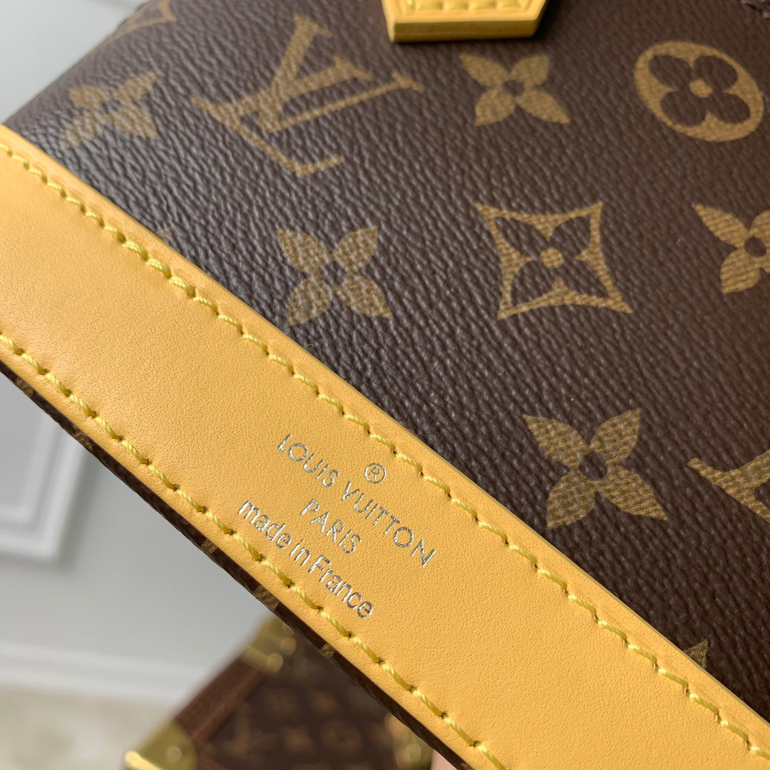Alma Nano 18 Monogram Canvas, piel de becerro amarilla