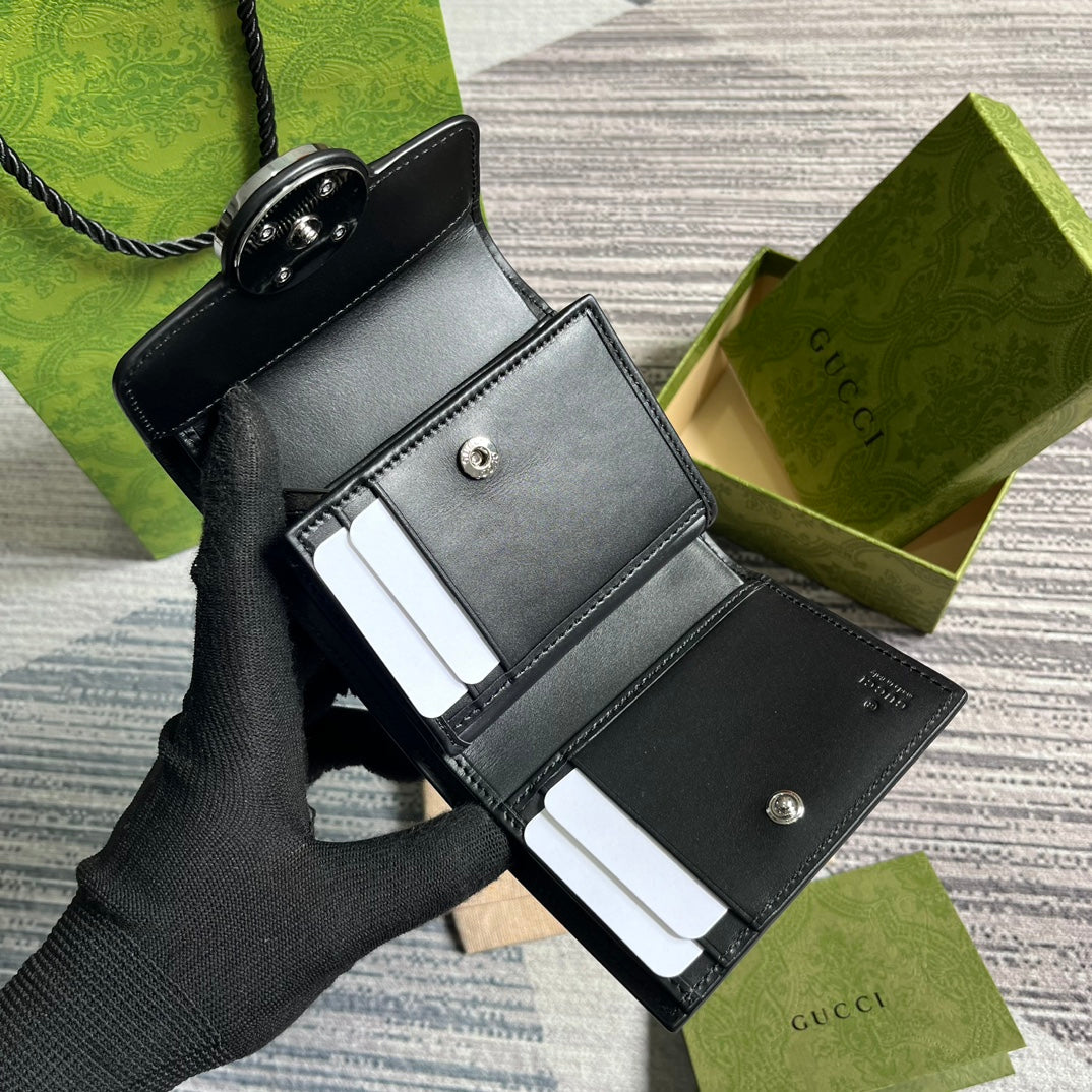 MINI CARTERA 11 EN PIEL DE BECERRO NEGRA