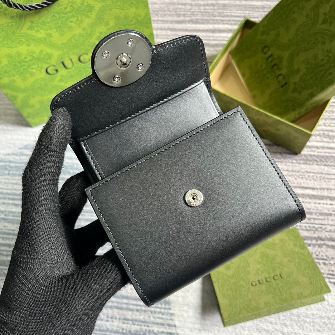 MINI CARTERA 11 EN PIEL DE BECERRO NEGRA