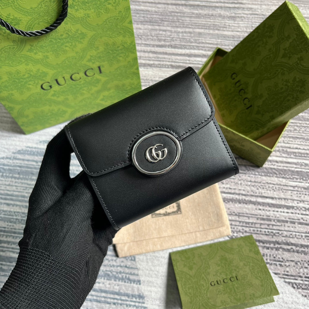 MINI CARTERA 11 EN PIEL DE BECERRO NEGRA