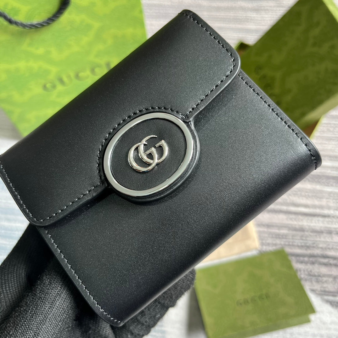 MINI CARTERA 11 EN PIEL DE BECERRO NEGRA