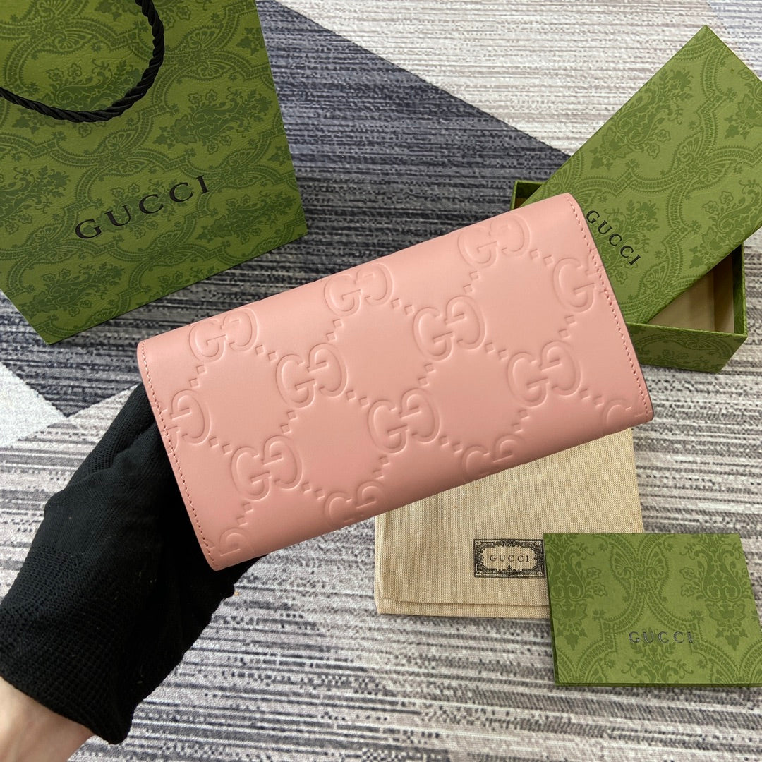 CARTERA CONTINENTAL 19 EN PIEL DE BECERRO REVESTIDA ROSA CON HERRAJES DORADOS