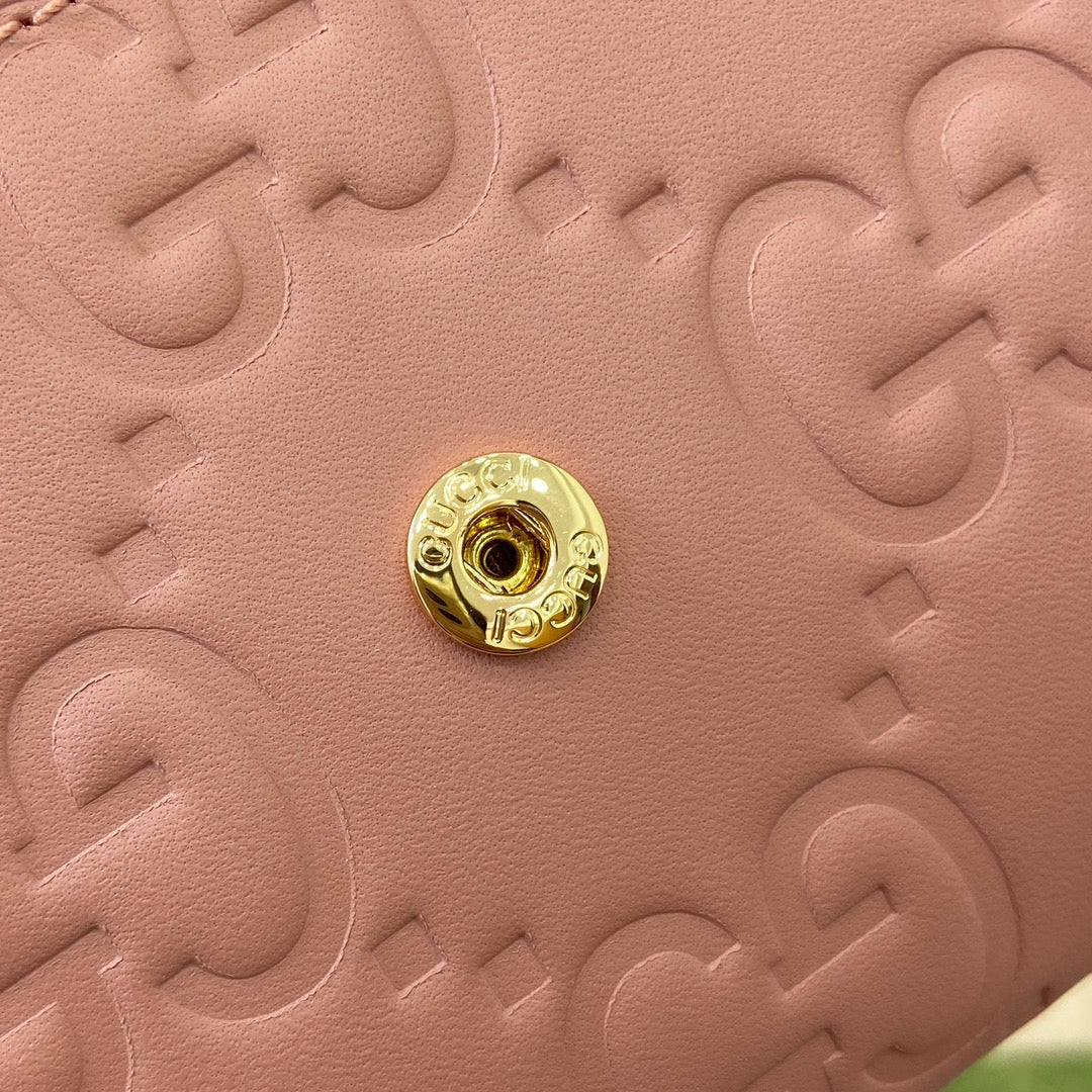 CARTERA CONTINENTAL 19 EN PIEL DE BECERRO REVESTIDA ROSA CON HERRAJES DORADOS
