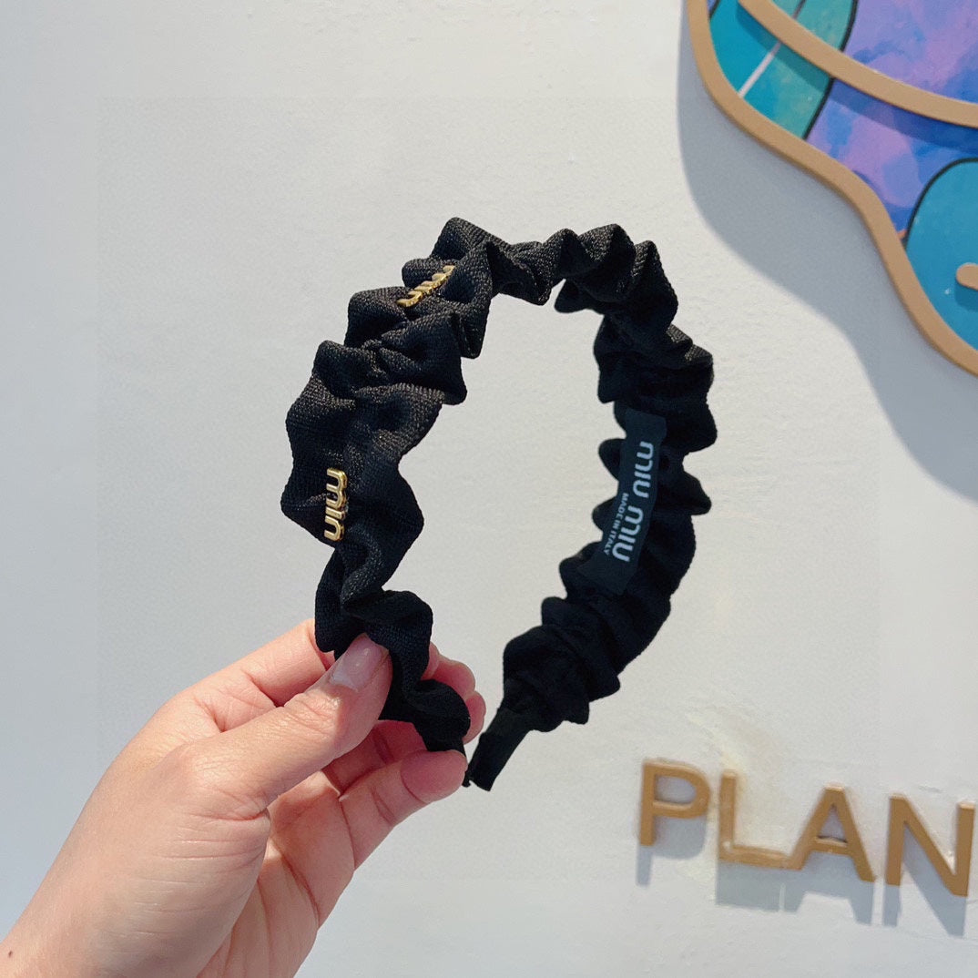 BANDEAU EN NYLON NOIR FROISSÉ LOGO DORÉ 415930