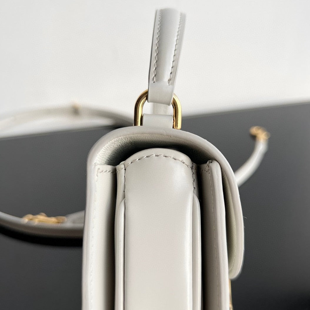 Sac à main TRIOMPHE 15 en cuir de veau blanc