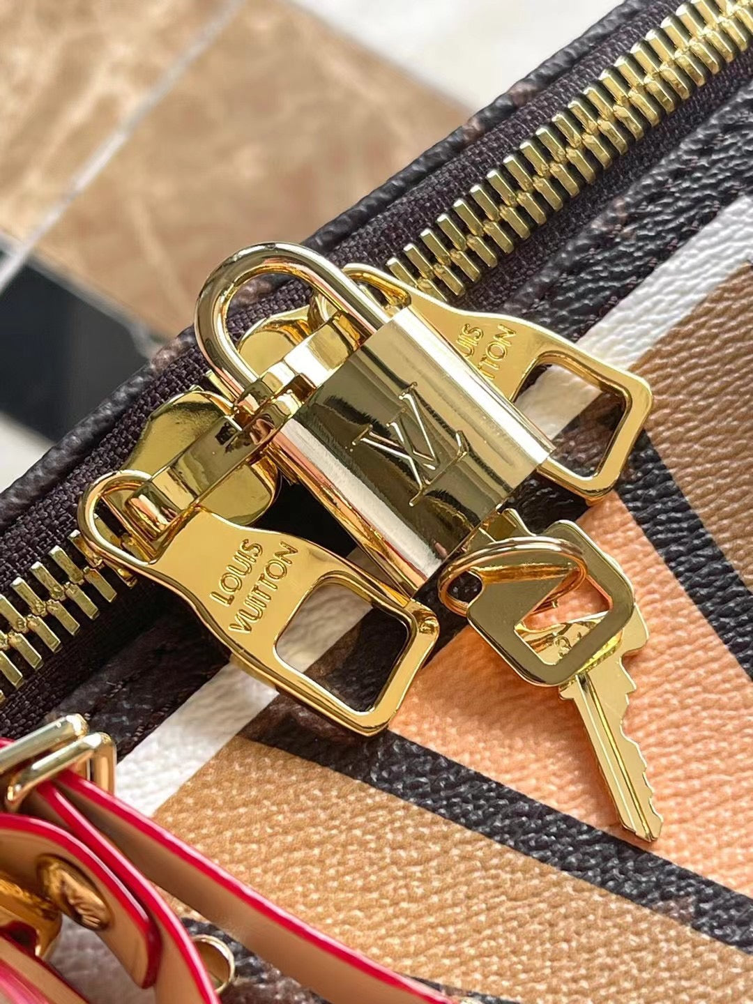 KEEPALL BANDOULI¨¨RE 50 EN LONA CON MONOGRAMA Y PATRÓN DE PARFLECHE