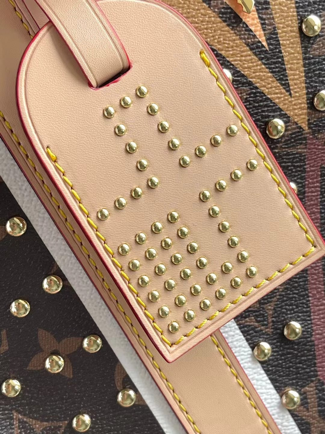 KEEPALL BANDOULI¨¨RE 50 EN LONA CON MONOGRAMA Y PATRÓN DE PARFLECHE