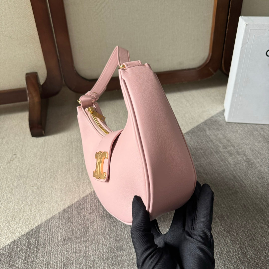 BOLSO MEDIANO AVA TRIOMPHE 23 EN PIEL DE BECERRO LISA ROSA CLARO CON HERRAJES DORADOS