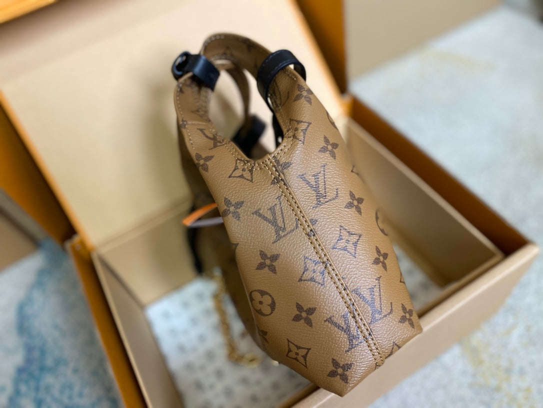 ATLANTIS BB 17 EN LONA REVERSA CON MONOGRAMA MARRÓN