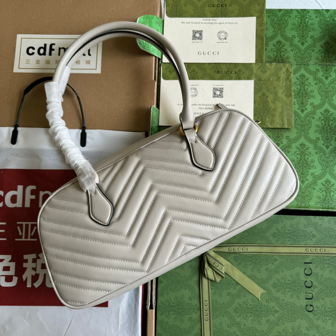 Bolso mediano GG Marmont con asa superior, 35 cm, piel de becerro color crema, herrajes dorados