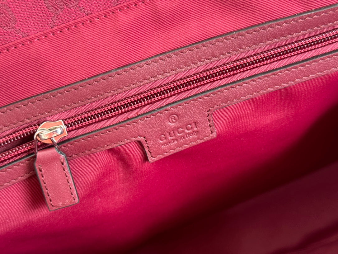 BOLSO DE MANO GRANDE DE 45 EN LONA CON MONOGRAMA COLOR ROJO VINO