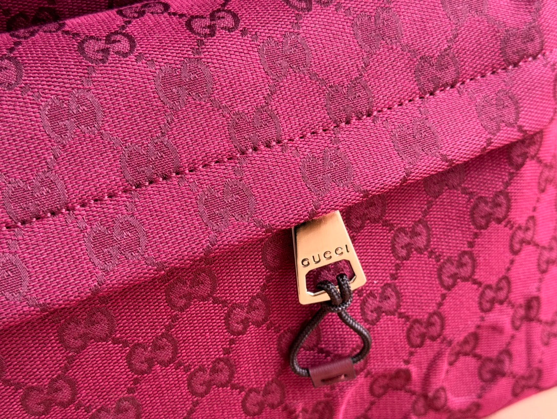 BOLSO DE MANO GRANDE DE 45 EN LONA CON MONOGRAMA COLOR ROJO VINO