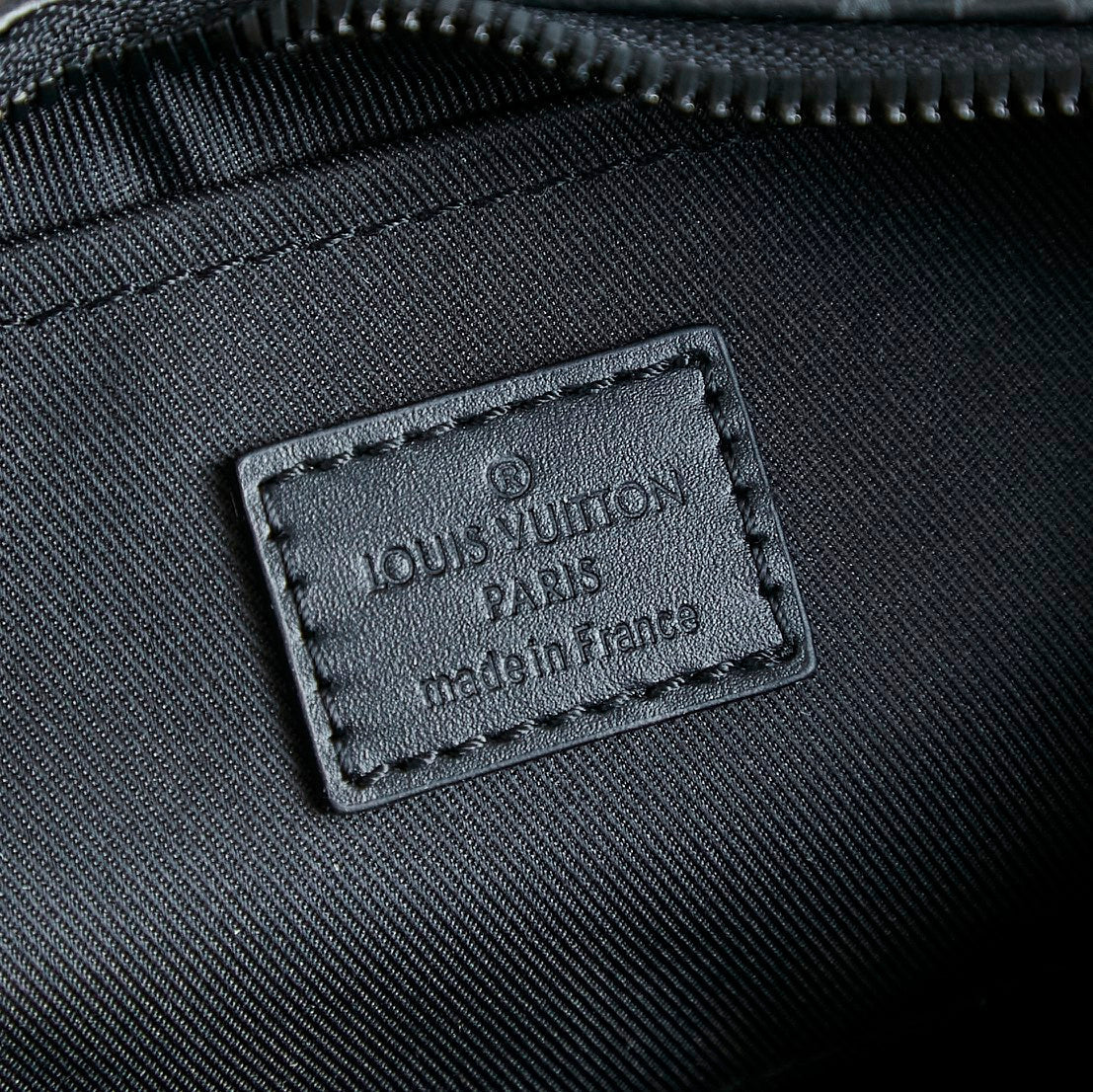 BOLSO HAMAC 28 EN LONA NEGRA MONOGRAMA ECLIPSE