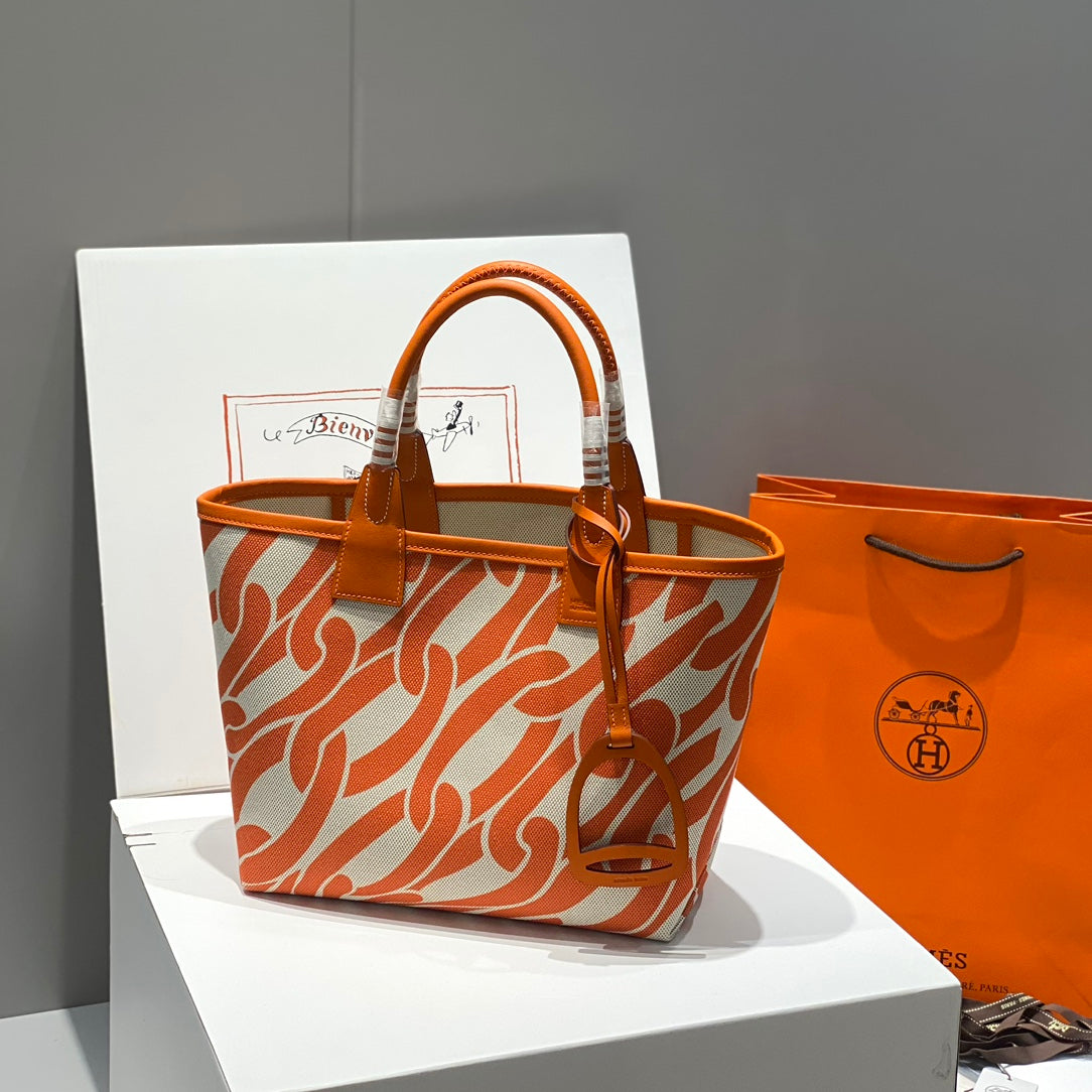Bolso HM Steeple 28 de piel de becerro marrón y lona blanca y marrón