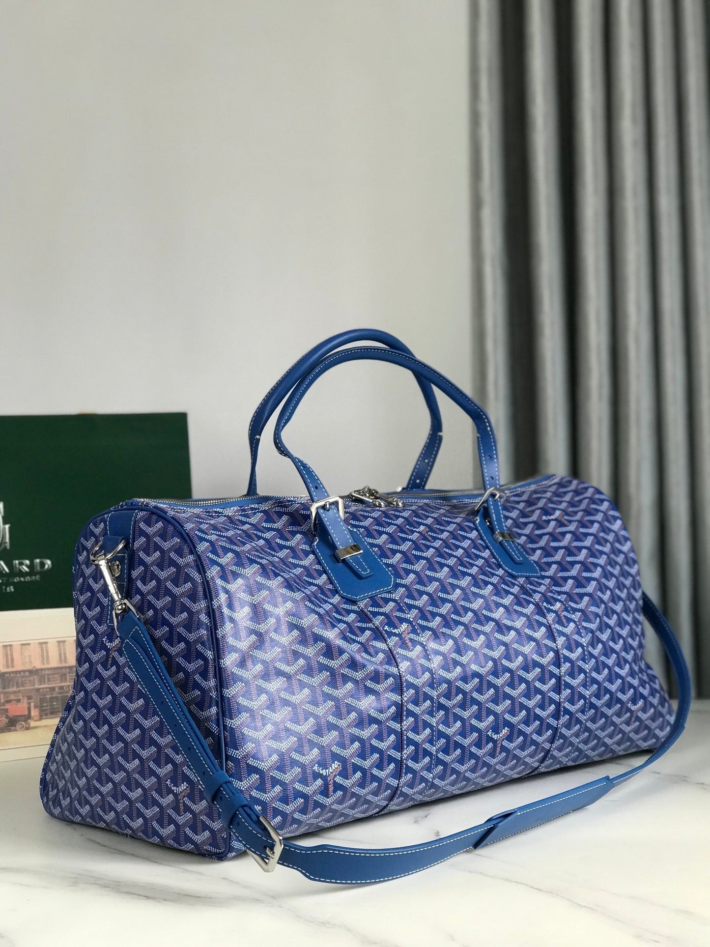 BOLSO BOSTON 50 EN LONA GOYARDINE AZUL ZAFIRO Y RIBETE DE PIEL DE BECERRO