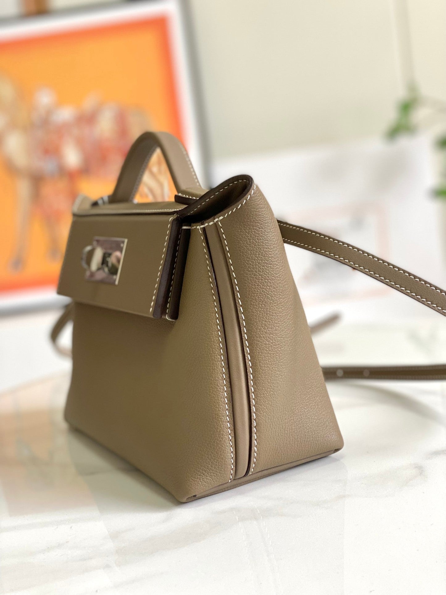 Bolso mini HM 24/24 de 21 cm, piel Etoupe Evercolor, herrajes plateados